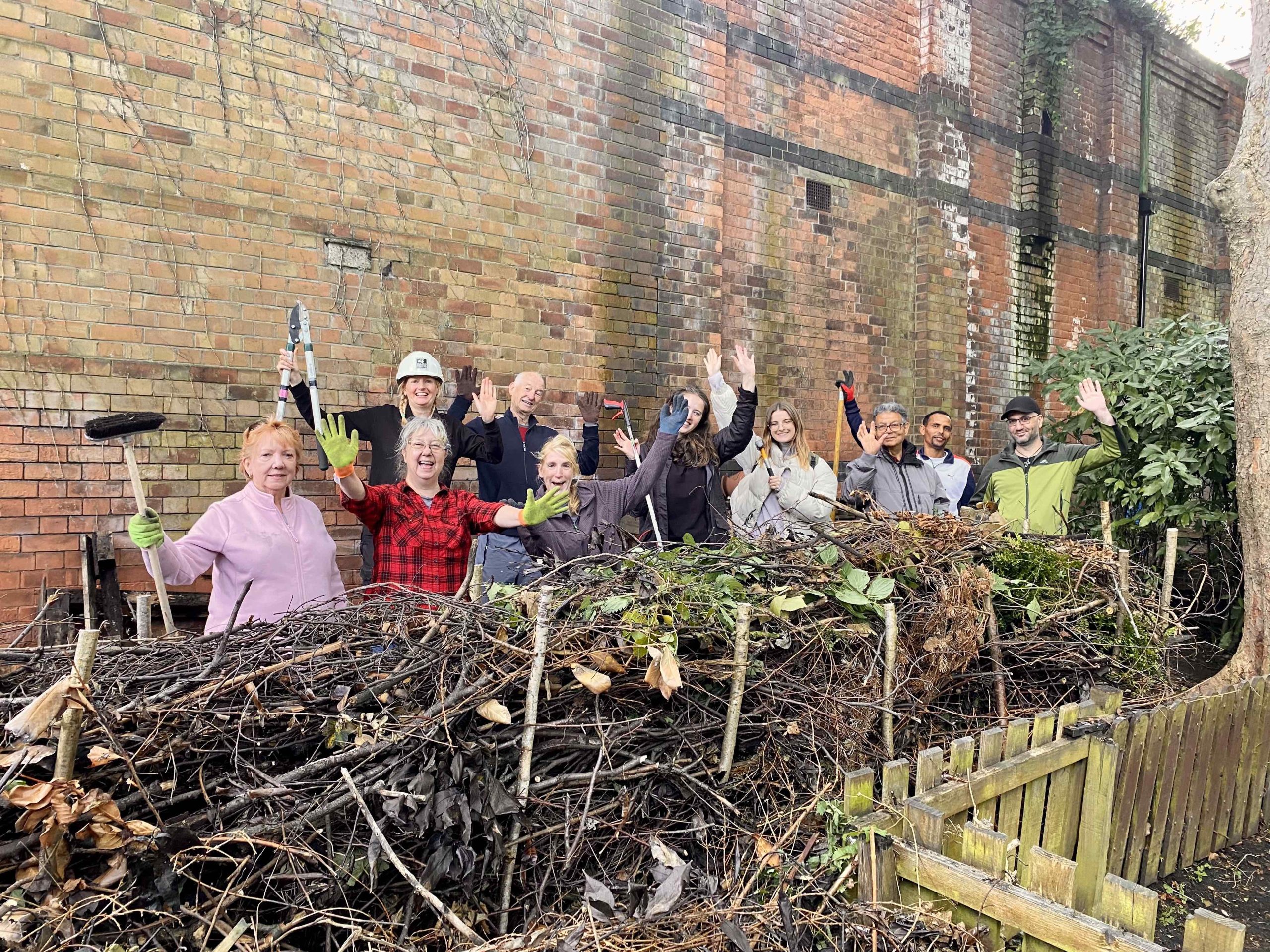 Volunteers with finished dead hedge